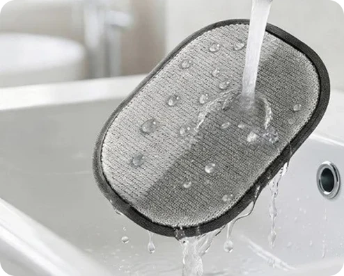 Rinsing the glove under running water